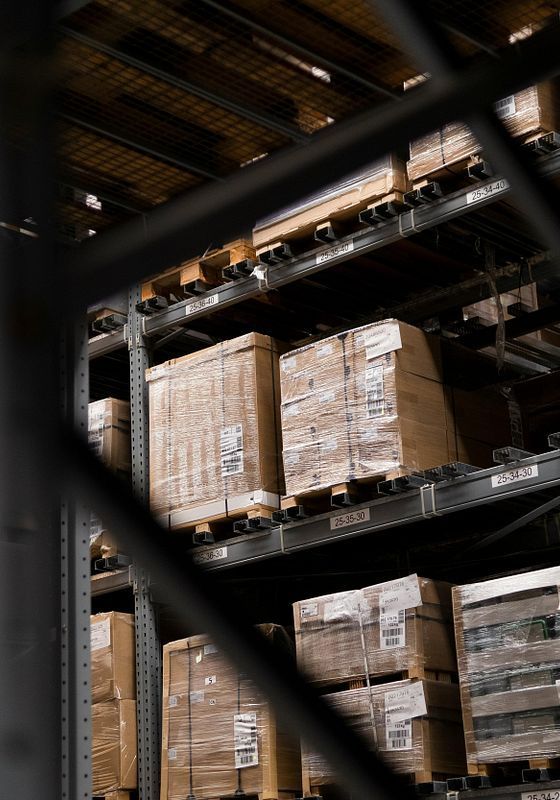 Palletized goods stored on warehouse shelving